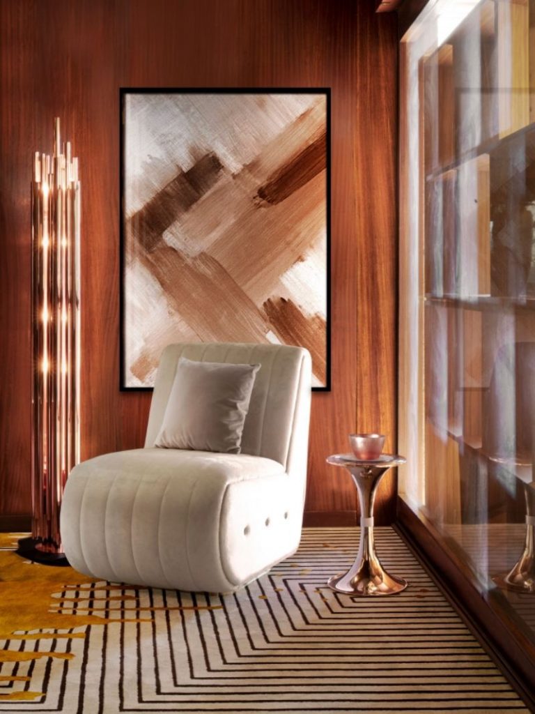 modern reading corner with VALENCIA RUG in black and white with a touch of yellow, white mid century armchair and standing lamp. Why Modern Wool Rugs Are The Best For A Reading Corner Interior Design