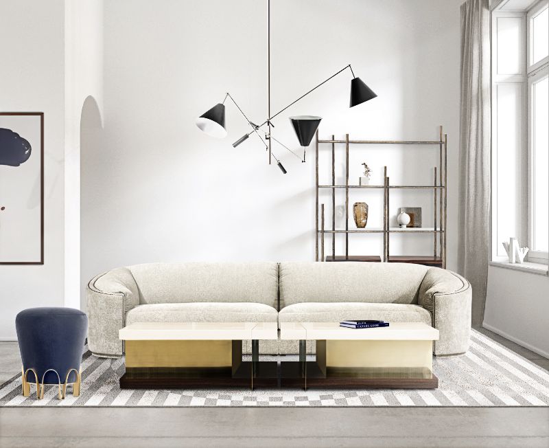 Modern living room with stirped Ocli Rug in gray and white, with a white soffa and center table