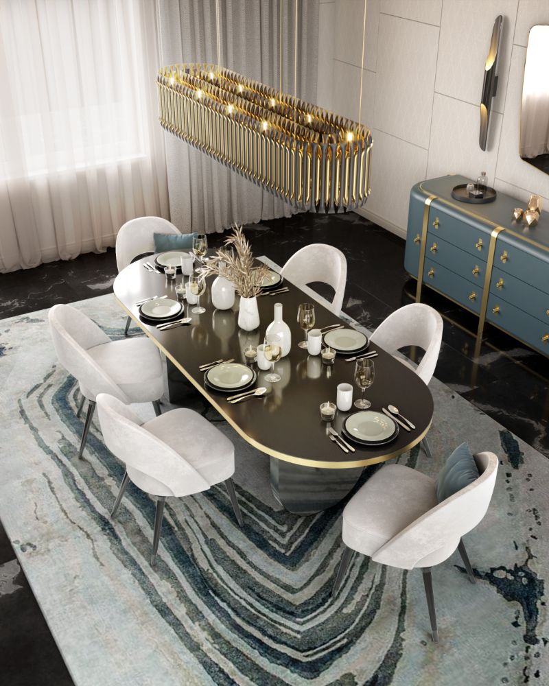 Elegant modern contemporary dining table with Agatha Rug and white dining chairs, golden hanging lights and dining table