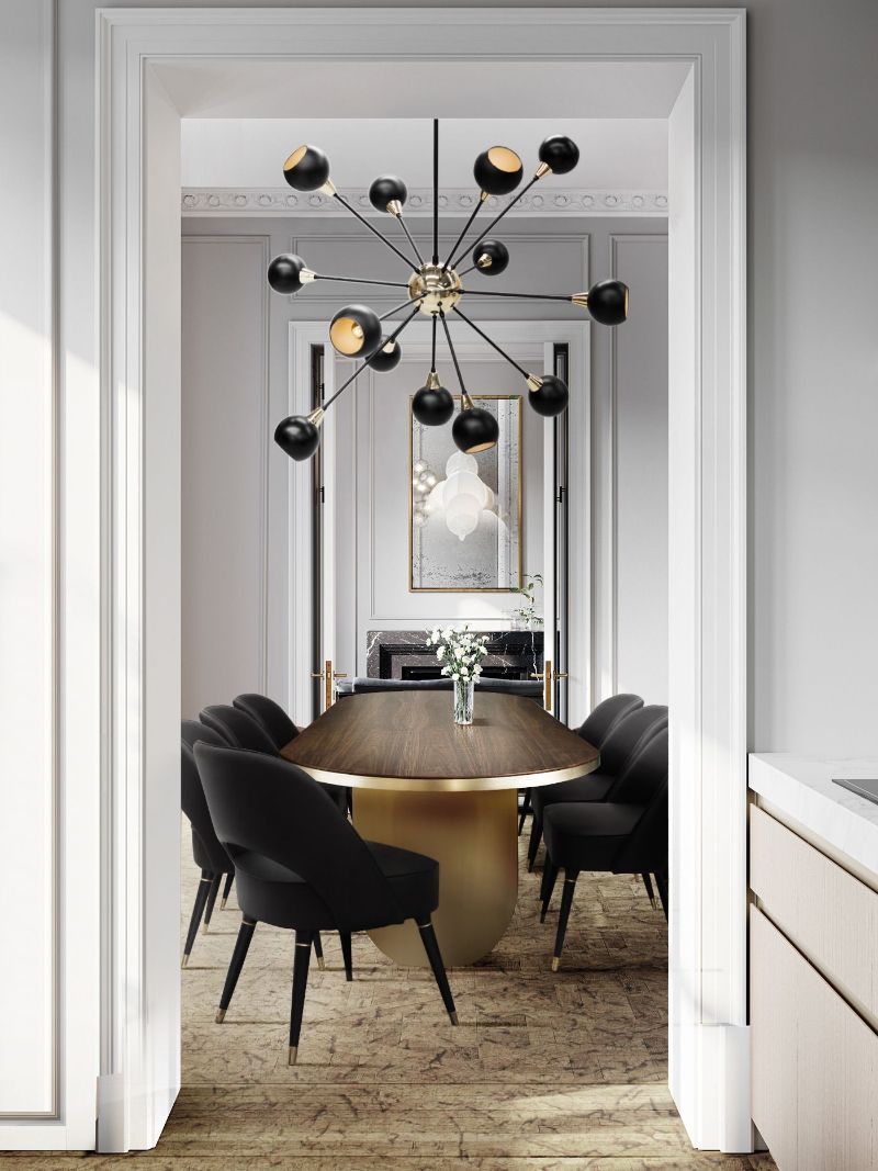 modern contemporary rug  in dining room with black dining chairs and wooden dining table