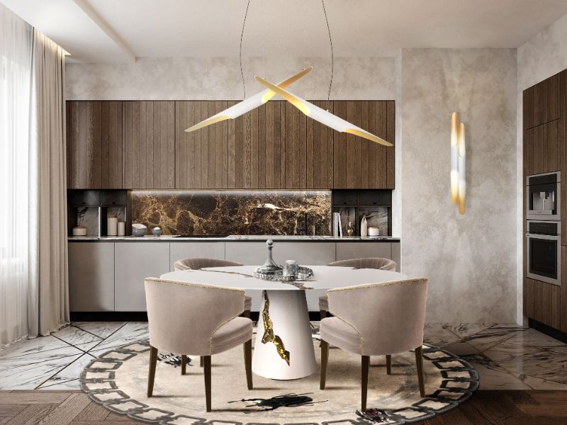Modern dining rooom with Golden bugs rug, round marbled dining table and beige dining chairs