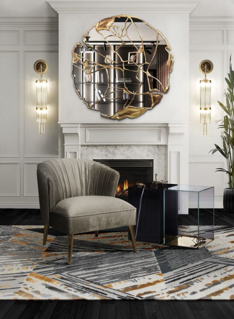 Unique Modern Rugs For Your Living Room, modern classic living room with the Xisto rug, gray and gold rug with gray armchair, golden round mirror, gold wall lights