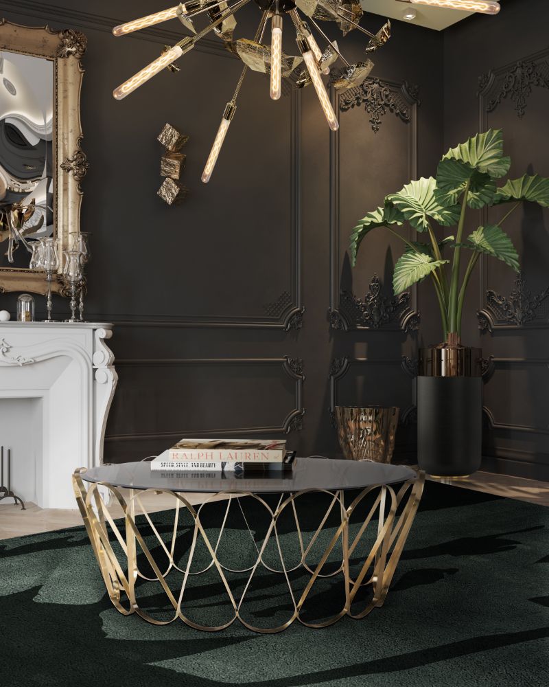 Unique Modern Rugs For Your Living Room, modern classic living room with modern Triology rug, black and gold center table, with golden supernova hanging light