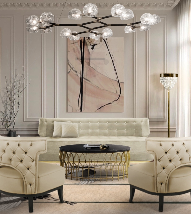 Modern contemporary living room with the Heron rug, Kansas Armchair in beige, Horus II suspension lights and Mecca Center table