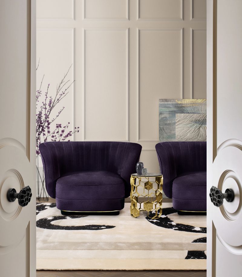 Classic living room with Imperial Snake Rug, velvet dark purple armchairs and golden side table
