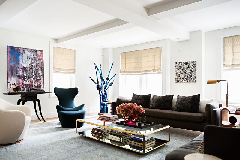 Modern Living Room Adorned With Black and Gold Area Rugs