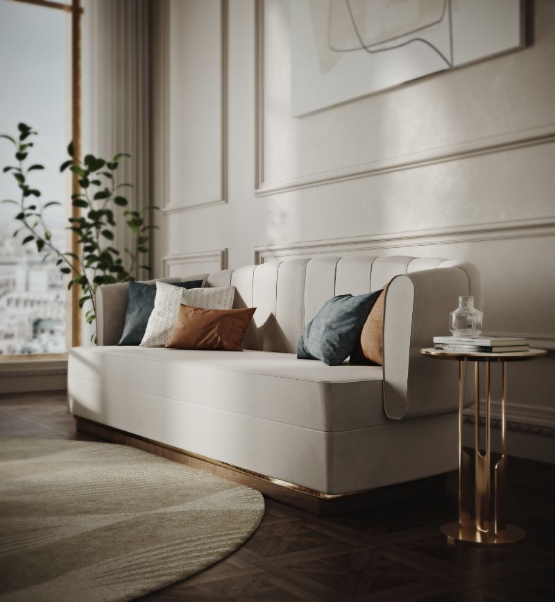 Modern contemporary living room with round rug, white sofa and golden side table