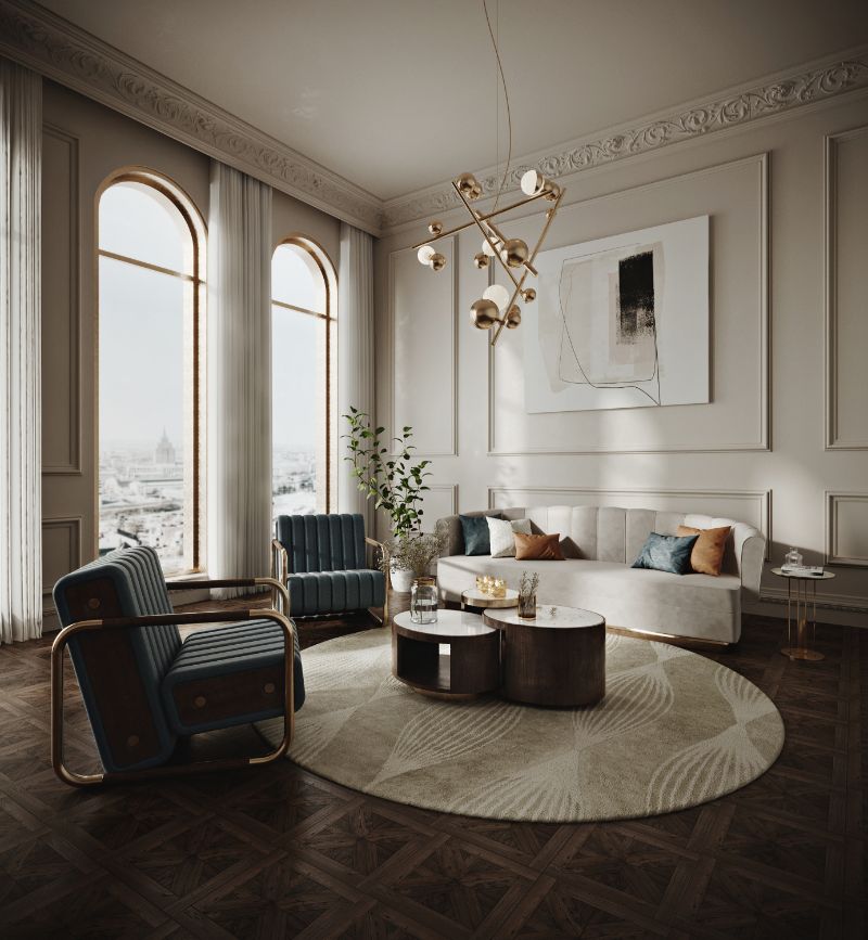 Modern living room with neutral tones, a round rug to decorate the floors and mid-century blue amrchairs with brown center table