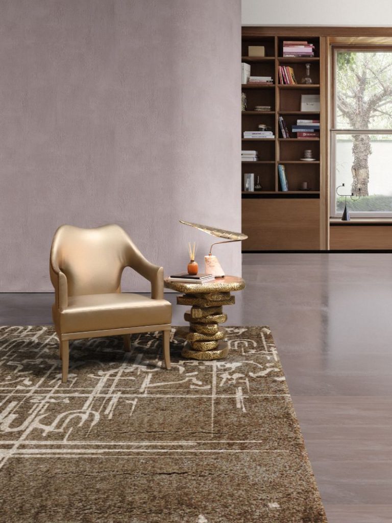 Modern classic living room corner with neutral version of the Black Ink Rug with gold armchair and side table