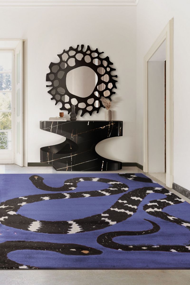 Modern hallway with the fabulous purple SNAKE RUG paired with a black console and mirror