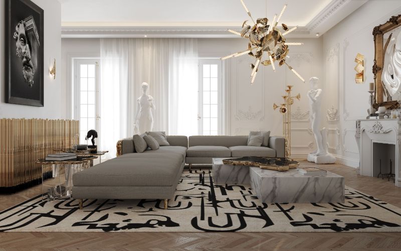 modern living room with black ink rug and supernova chandelier with gray imperfectio sofa
