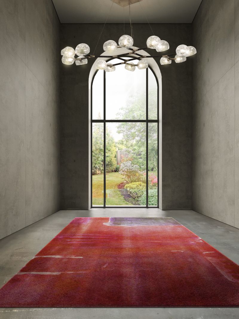 modern contemporary hallway with the colorful TOULOUSSE RUG in red with horus suspension lights. Carpet Decorating ideas In The New Rug Society's 2022 Catalogue