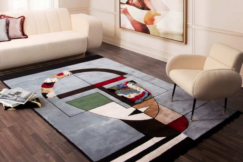 Contemporary living room with blue MIRÓ RUG and white sofa  The Most Exquisite Artistic Rug Collection