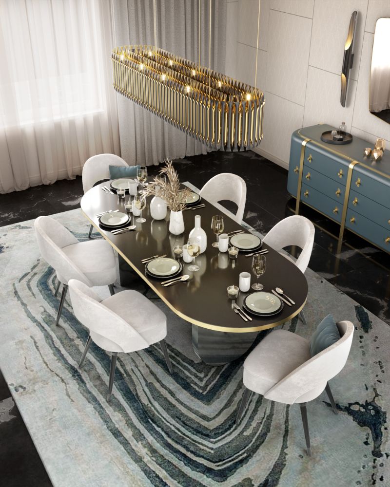 Modern mid-century dining room with blue rug. Dining Room Rugs That Will Brighten Your Eating Space
