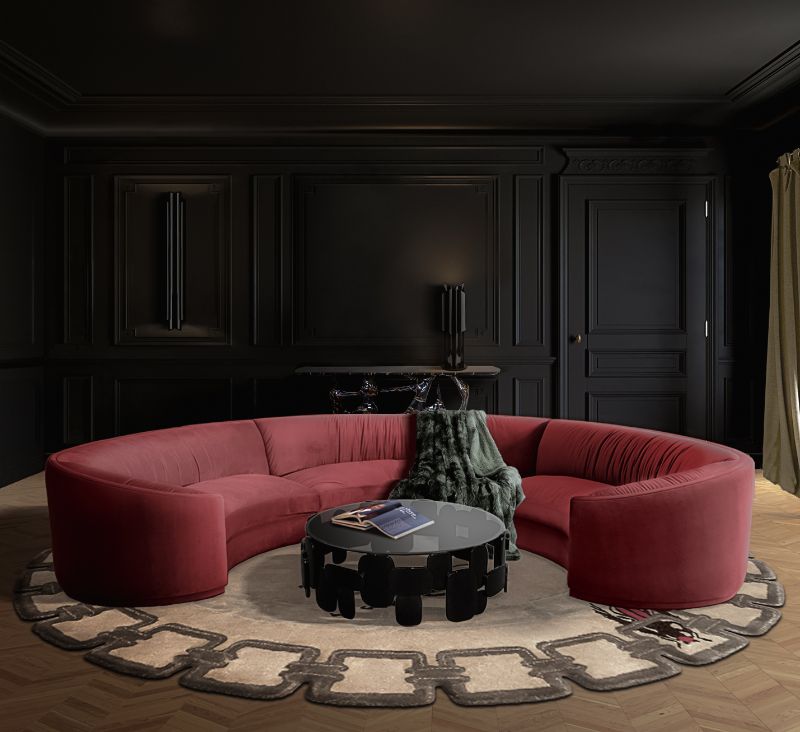 contemporary living room with round neutral rug with bugs design and a curved red sofa. Dashing Living Room Decor With Neutral Rug