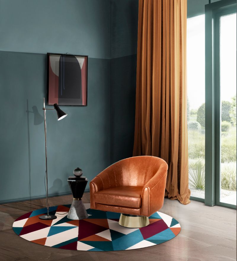 Mid-century reading corner with a round rug in tones of blue and red and with diamond shapes. Mid-century Carpet Ideas: A Curated Selection of Rugs