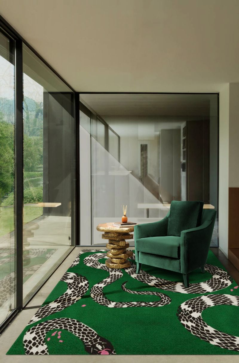 cozy reading corner with green rug and armchair. What Are The Rug Trends For 2022?
