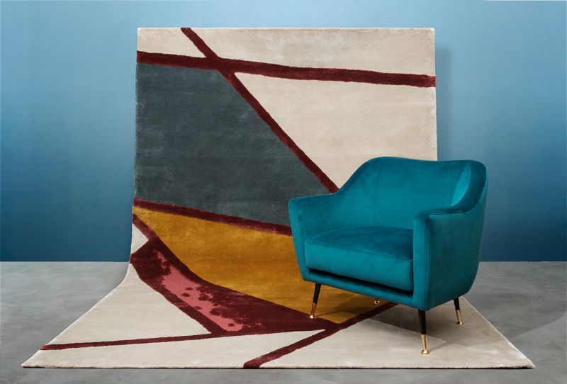 handmade wall rugs: geometric rug with a lot of vibrant colors.