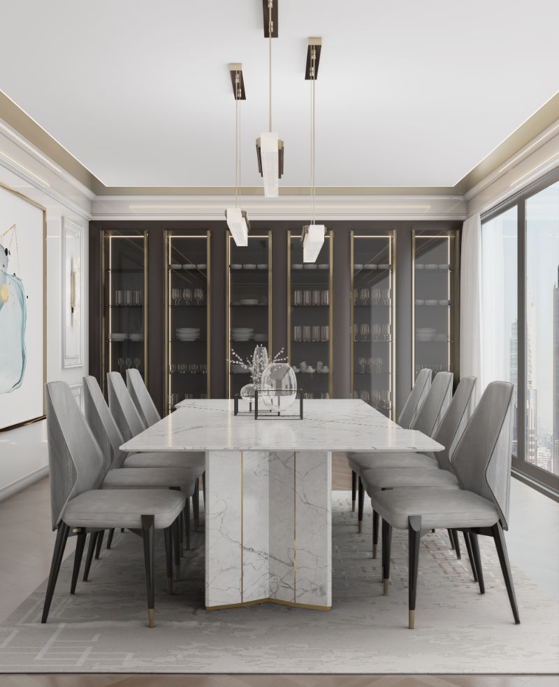 Luxurious dining room design with a magnificent marble table combines with modern grey chairs