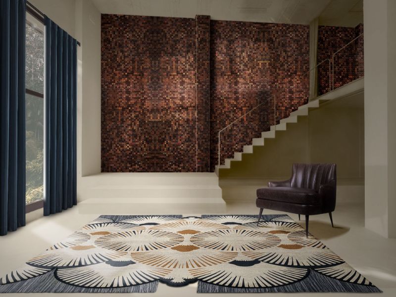 Hallway Decor Tips: irregular shaped rug with colorful hues and mid century amrchair