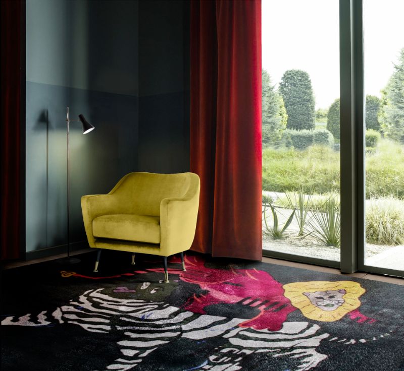 Modern contemporary reading corner with a bold decor. Black area rug with a touch of yellow and red and yellow armchair. reading corners ideas