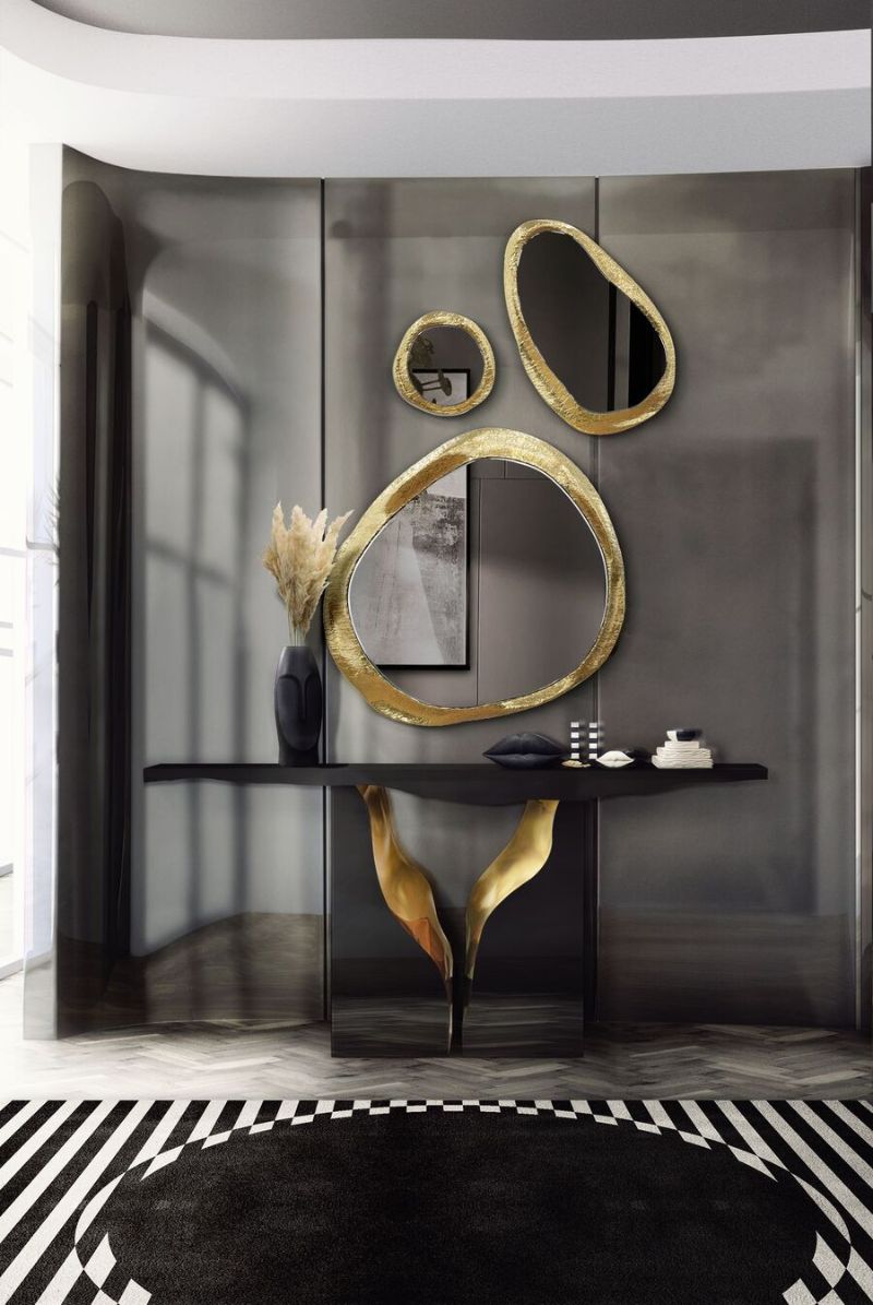 mirror for the living room with black and white rug and oval mirror shapes