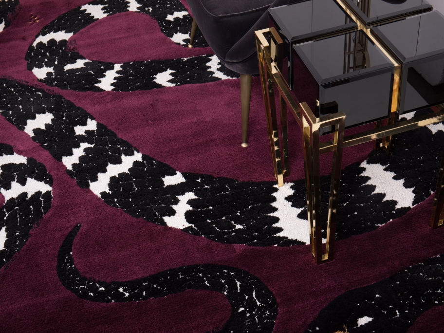 The burgundy SNAKE 8 RUG's rich colors provide drama, vitality, and passion to this contemporary interior design. winter interior design trends